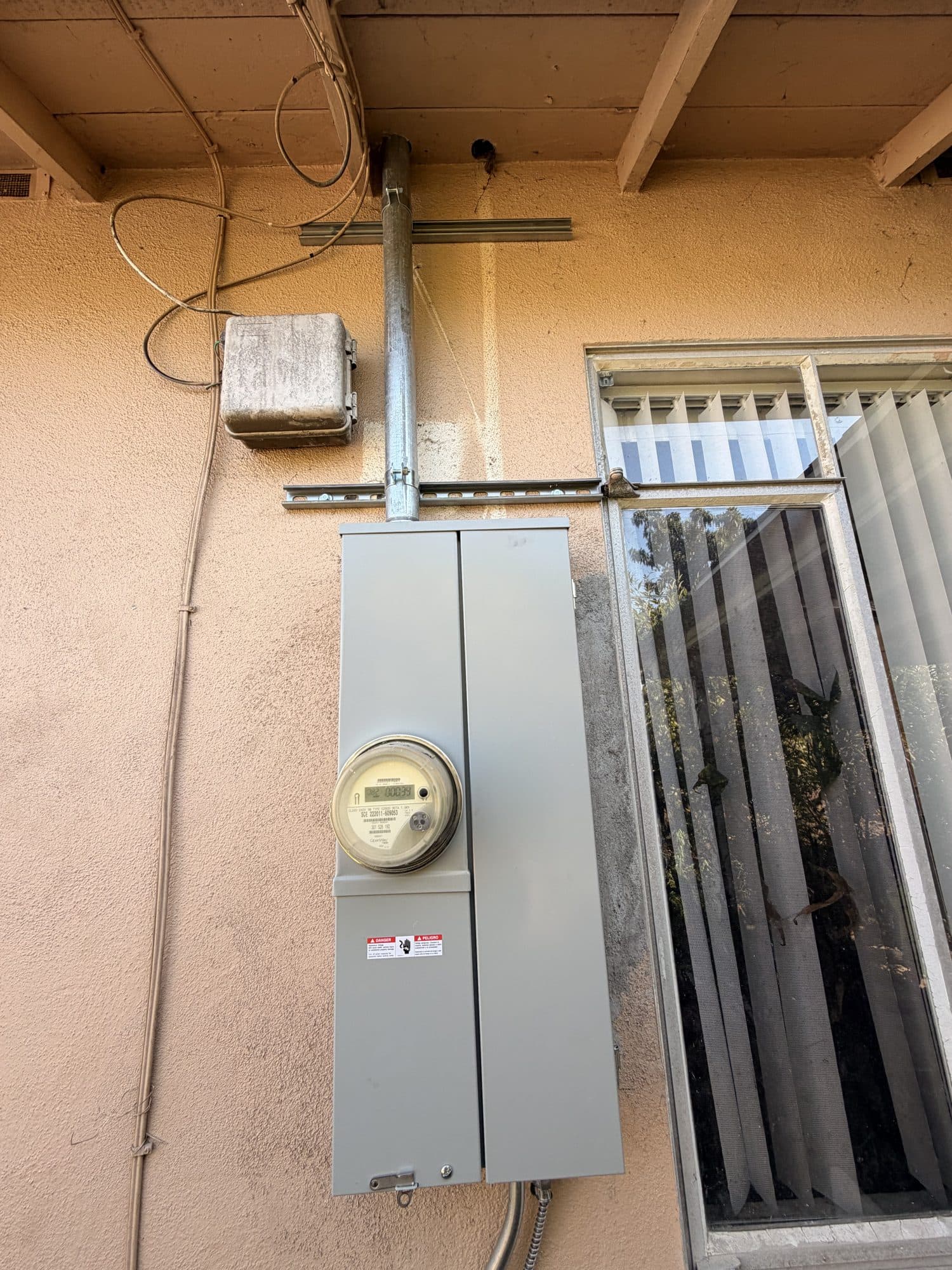 New 200 amp-class meter main panel installed on the side of a home